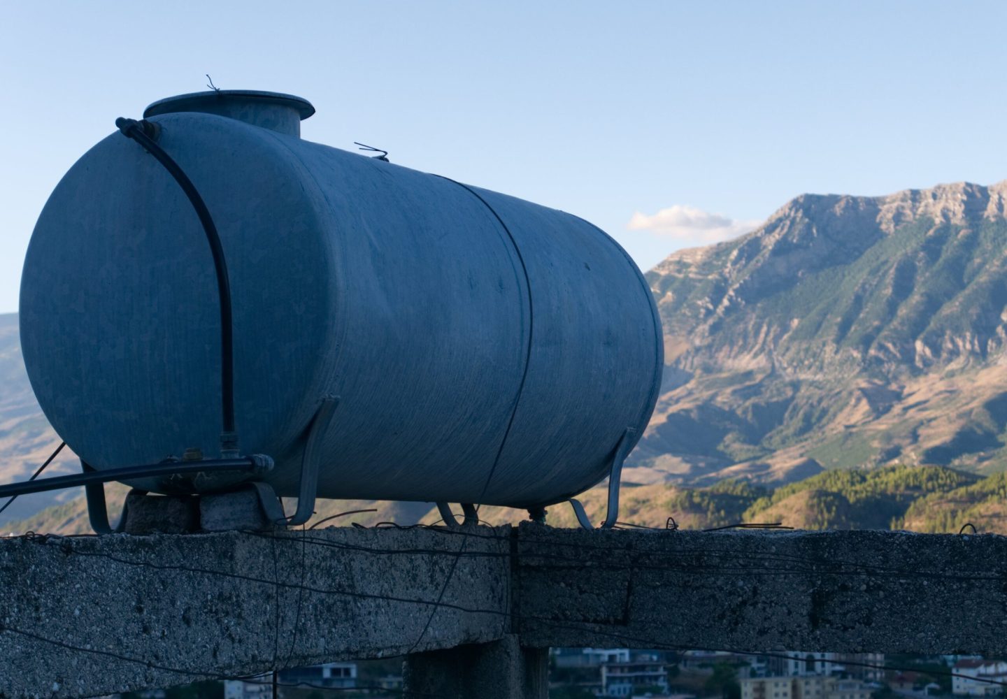 scenic-view-mountains-against-clear-sky-min